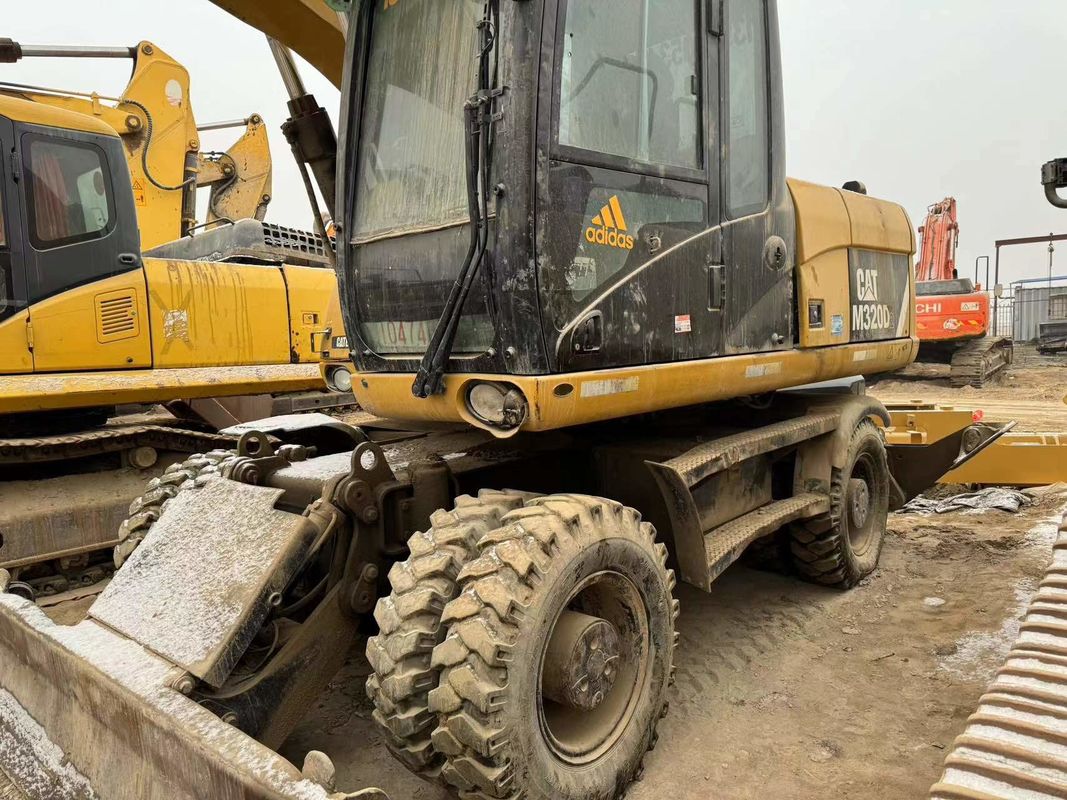 90% Caterpillar M317D2 Xe đào bánh xe cũ với chất lượng cao và hiệu suất tốt nhất để bán